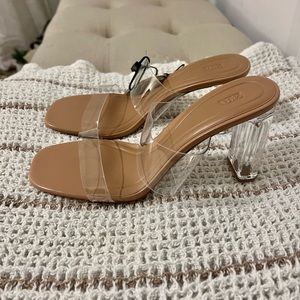Nude heels with tag